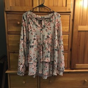 Torrid!  Beautiful tan/flowered print blouse.